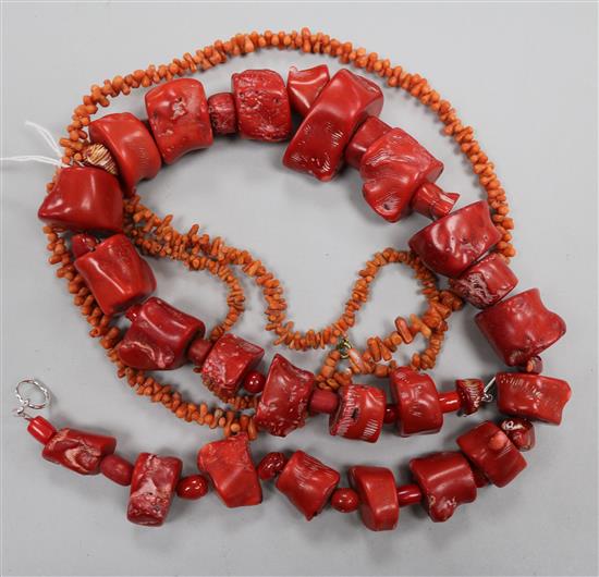 Three assorted coral necklaces.